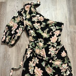 Floral dress with one sleeve and matching belt.